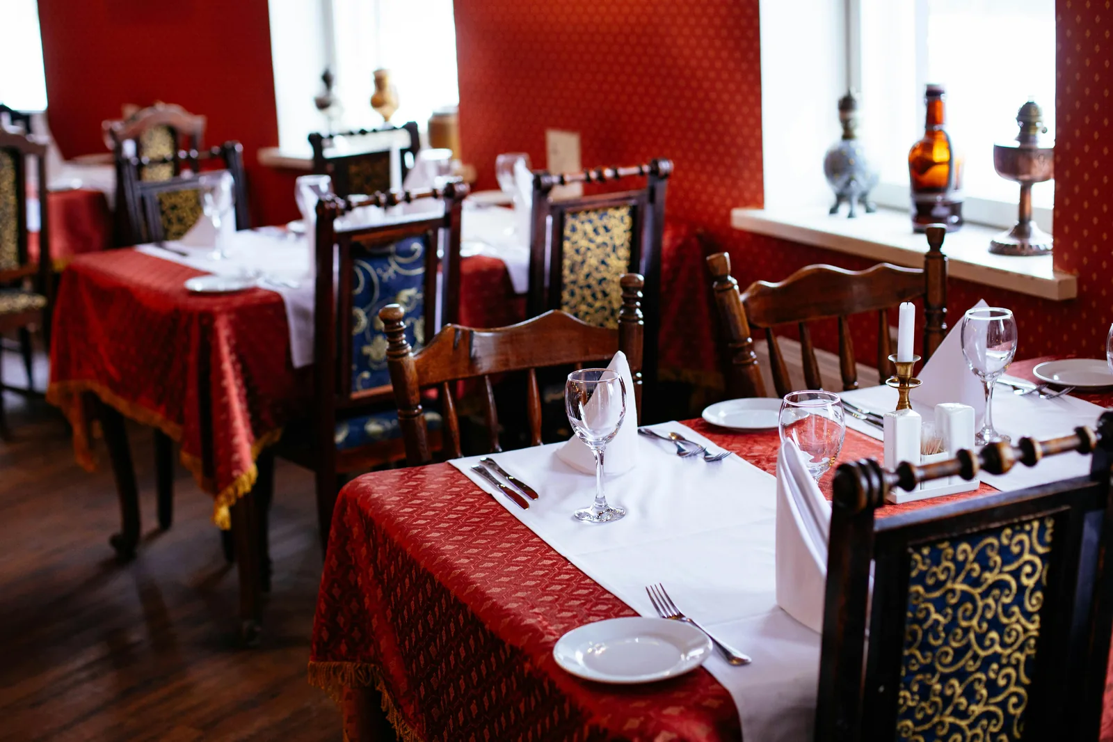 Classic upscale dining room prepared for guests.